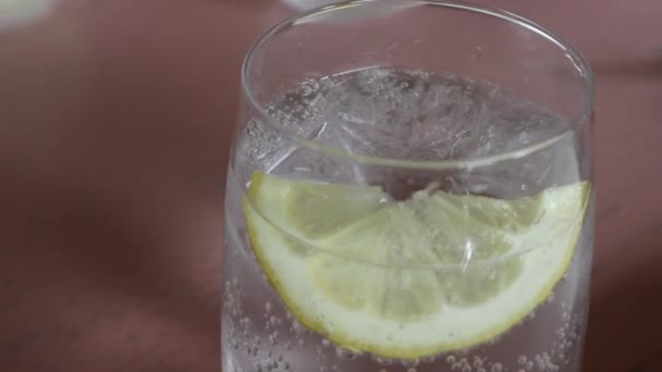 Sparkling Water Lemon Bubbly Fizzy Tonic Soda Drink Served Glass — Stock Video
