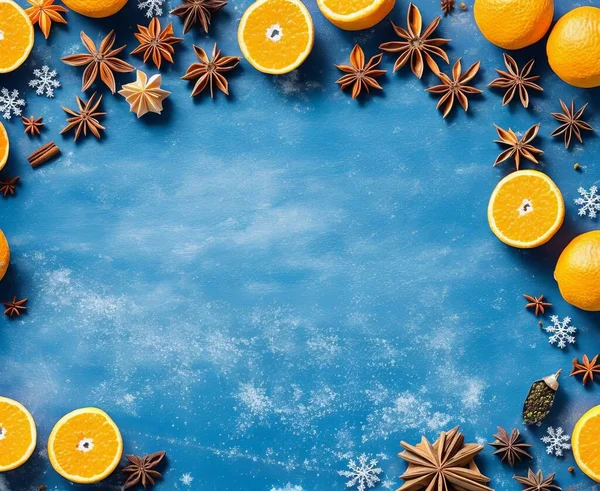 christmas background with dried oranges and cinnamon. top view. copy space.