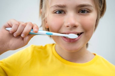 SchoolBoy Brush Teeth Child Looking At Camera Over White Background, Dentistry, Stomatology, Dental Care Hygiene With Toothbrush Toothpaste, Morning Evening Routine, Lifestyle, Health Care.