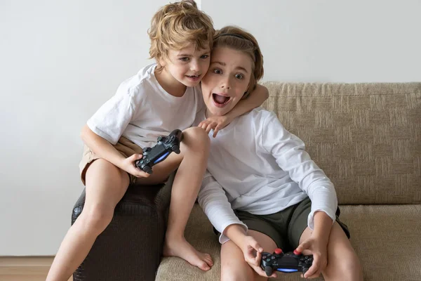 Excited Children Playing Video Games Ps5 Xbox Controller Console Two —  Fotos de Stock