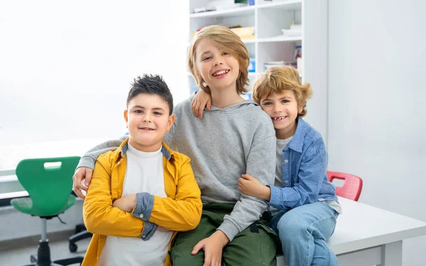 stock image Additional educational course class. Group of student study foreign languages, programming, coding, math or other sciences. STEM. Children posing looking at camera. Advertisement