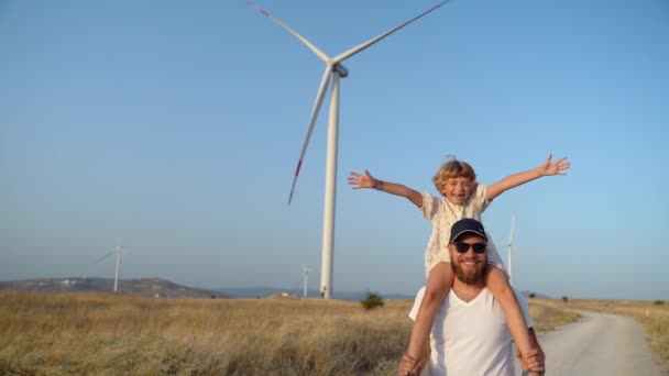 Man Carrying His Child Girl His Shoulders Walking Wind Farm — Stock Video