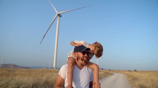 Man Carrying His Child Girl His Shoulders Walking Wind Farm — Stock Video