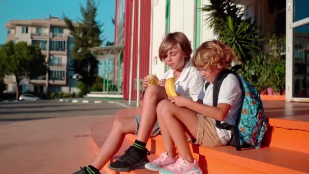 Children Students Eating Lunch School Yard Break Sitting Porch Share — Stock Video
