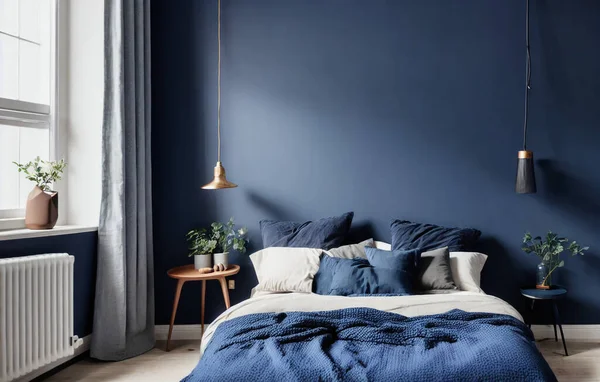 Dark bed and mockup dark blue wall in bedroom interior.
