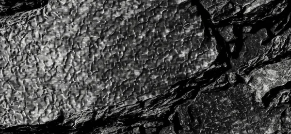 Black white stone texture. Rock surface. Close up.