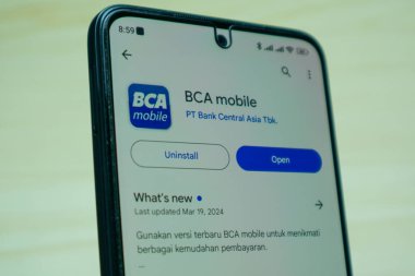 Bandung, Indonesia - April 19, 2024 : BCA Mobile application on android smartphone clipart