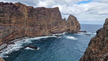 The Saint Laurent Peninsula on Madeira Island is a stunning natural enclave, renowned for its rugged cliffs and breathtaking coastal views. Visitors flock to this picturesque spot to soak in the beauty of the Atlantic Ocean. clipart