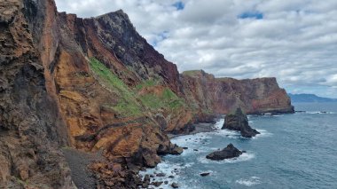 The Saint Laurent Peninsula on Madeira Island is a stunning natural enclave, renowned for its rugged cliffs and breathtaking coastal views. Visitors flock to this picturesque spot to soak in the beauty of the Atlantic Ocean. clipart