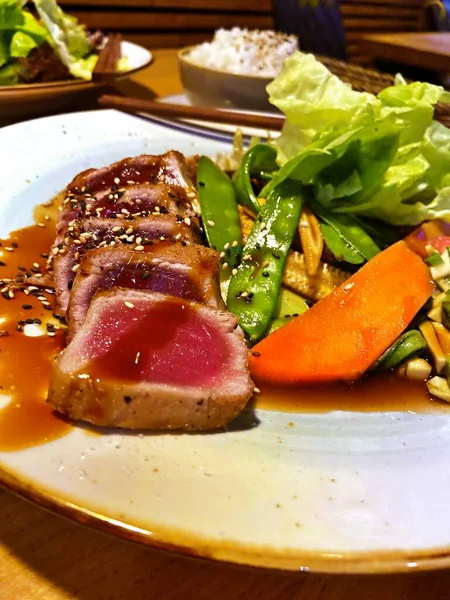 grilled tuna with sauce and vegetable