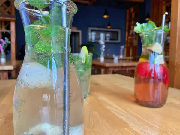 summer cocktails with strawberries and mint mojito