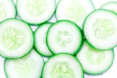 Close up Fresh cucumber slices isolated on white background. Long cucumber from Asian agriculture clipart