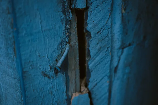 cracks or fissures in the walls of an old building