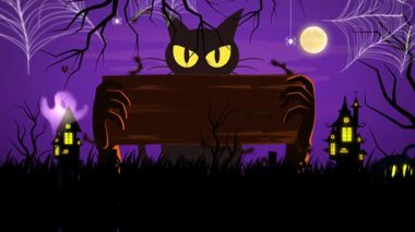 Ürkütücü Kara Kedi Cadılar Bayramı tabelasını tutuyor.