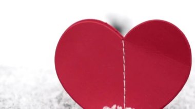 paper hearts harland red color isolated on snow ice background valentine day in love celebrate holiday mock up negative space slow motion.some hearts flat lay february 14th