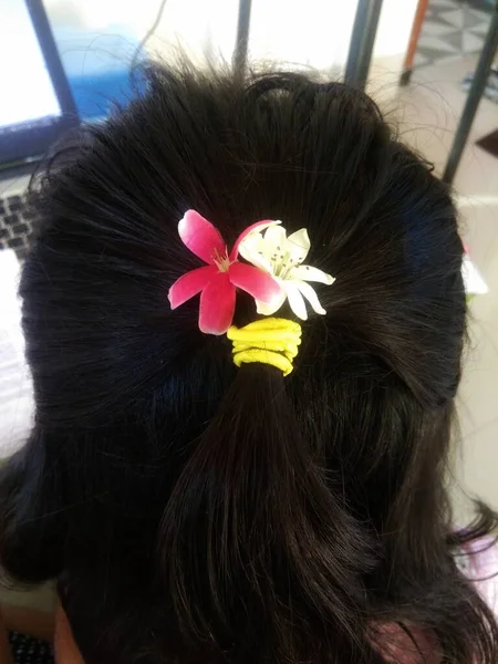 Flower ribbons are used in little girls hairs