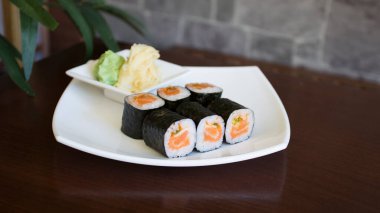 Salmon maki. In Japanese, the word maki means 