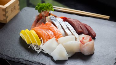 Sashimi Sushii Set with different kinds of fish like tuna and salmon.