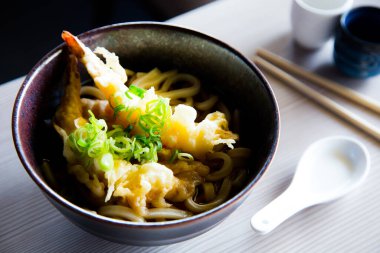 Ramen Japanese soup with shrimp and vegetables. Traditional Osaka recipe.