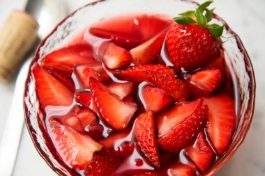 Strawberries cooked with red wine. Traditional Spanish dessert.
