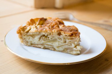 Apple cake with cinnamon and walnuts.
