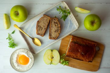Apple cake with cinnamon and walnuts.