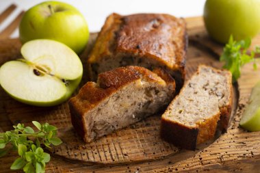 Apple cake with cinnamon and walnuts.