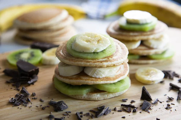 Pancakes Fresh Fruit Banana Strawberries Kiwi Dark Chocolate Covered — Fotografia de Stock