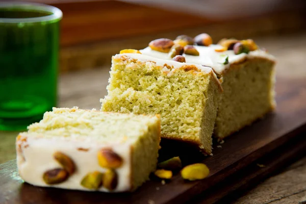 Pistachio Sponge Cake Covered Icing Sugar — Stock Photo, Image