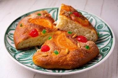 Coca de sant joan. Traditional San Juan cake to celebrate the arrival of summer in Spain made with brioche bread, candied fruit and nuts.