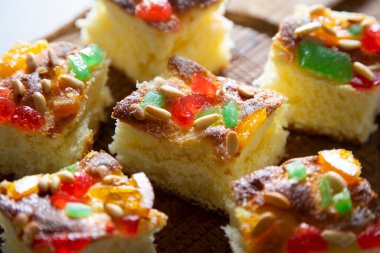 Coca de sant joan. Traditional San Juan cake to celebrate the arrival of summer in Spain made with brioche bread, candied fruit and nuts.