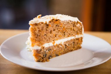 Carrot cake is a sweet cake with mashed carrots mixed into the batter. The carrot softens in the baking process, and the cake usually has a dense, smooth texture.