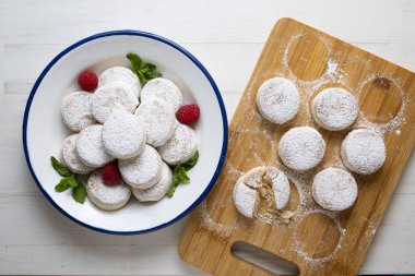 Manchego shortbread. Manchego mantecados are a sugar-coated sweet with a delicious flaky texture, typical of Spanish confectionery.