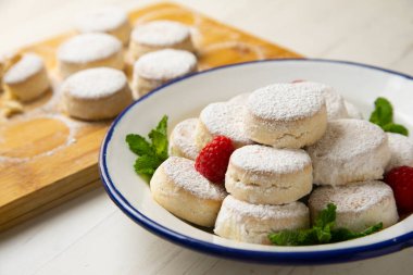 Manchego shortbread. Manchego mantecados are a sugar-coated sweet with a delicious flaky texture, typical of Spanish confectionery.