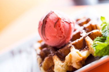 A waffle, also cited with the foreign words waffle, wafol, wafel or waffle, is a typical Belgian and northern French breakfast.