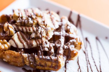 A waffle, also cited with the foreign words waffle, wafol, wafel or waffle, is a typical Belgian and northern French breakfast.