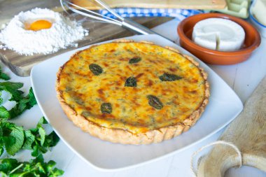 The flao is a pastry made with flour paste filled with cottage cheese or mat, cheese or cream, with different ingredients and shapes depending on the region of origin.