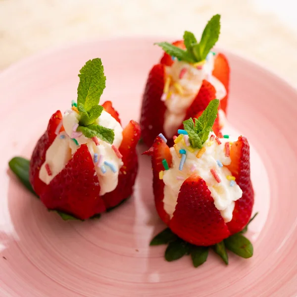 Spanish strawberries stuffed with cream and caramel shavings.
