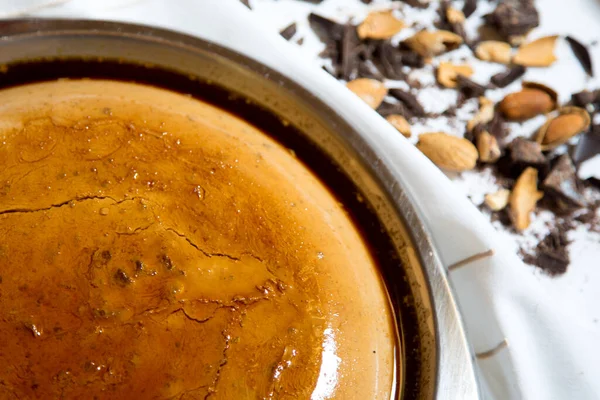 Chocolate pudding with almonds and caramel.