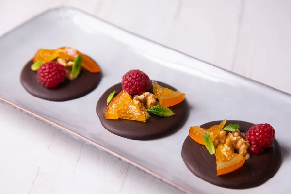 Chocolate Dessert Candied Orange Raspberry Nuts — Stock Photo, Image