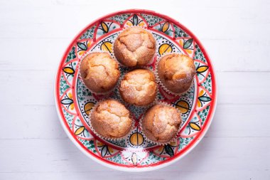 Homemade muffins made with egg and honey.