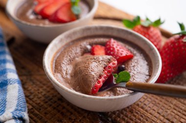 Chocolate mousse is a dessert of French origin, whose base is egg white mounted until stiff, or whipped milk cream, which give it a spongy consistency.
