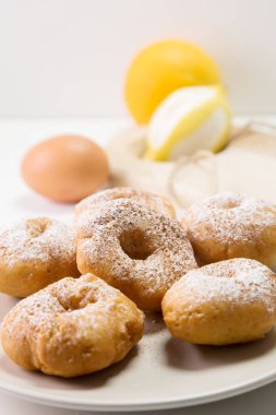 Traditional Spanish fried donuts made with lemon and cinnamon.