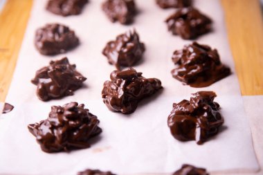 Chocolate rocks with toasted almonds. Traditional Spanish dessert.
