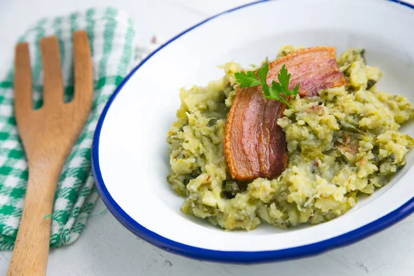 stock image The trinxat de la Cerdanya is a typical Catalan dish that looks like a small tortilla mixed with cabbage, pork belly and potato.