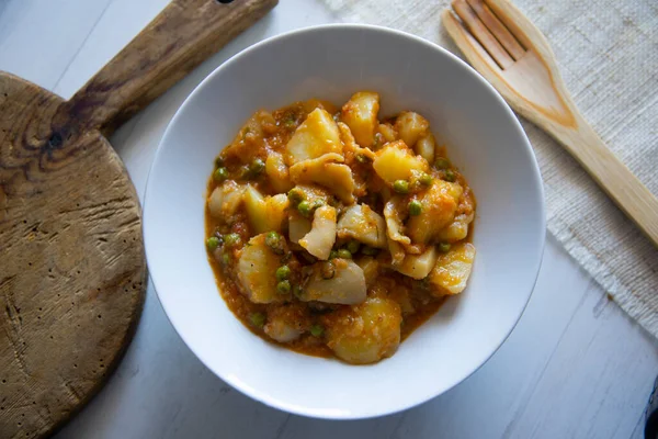 stock image Stewed cuttlefish with potatoes. Traditional Spanish tapa recipe.