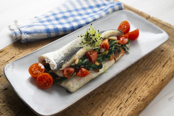 Baked Sea Bass Stuffed Spinach Tomatoes Pine Nuts — Stock Photo, Image