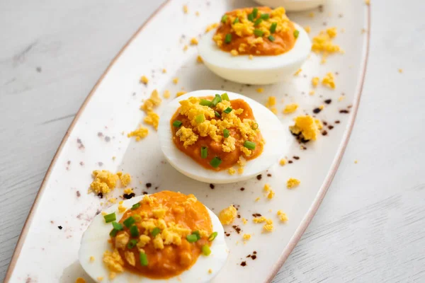 stock image Boiled eggs stuffed with tuna and tomato paste.