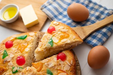 Coca de sant joan. Traditional San Juan cake to celebrate the arrival of summer in Spain made with brioche bread, candied fruit and nuts.