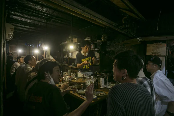 Stock image Tokyo, Japan; 1st October 2023: Atmosphere at Izakaya restaurant on Omoide Yokocho Street in the Shinjuku district of Tokyo.